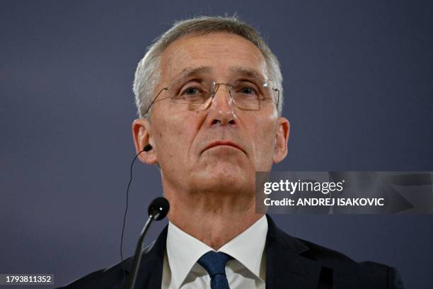 Secretary General of the Northern Atlantic Alliance , Jens Stoltenberg listens during a joint press conference with Serbian President following their...