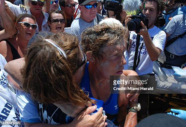 Diana Nyad told the crowd to "never give up" after she finished her historic 110-mile swim after finishing her historic swim from Havana, Cuba, to...