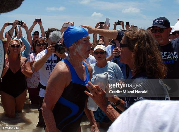 Diana Nyad is met by trainer Bonnie Stoll after she finished her historic 110-mile swim after finishing her historic swim from Havana, Cuba, to Key...