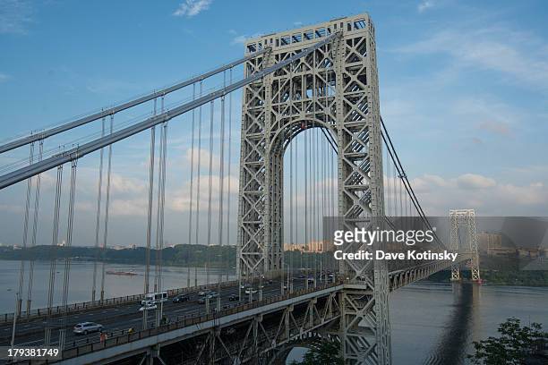 The World's Largest American Flag retracts as Labor Day 2013 comes to and end at The George Washington Bridge on September 2, 2013 in Englewood City,...