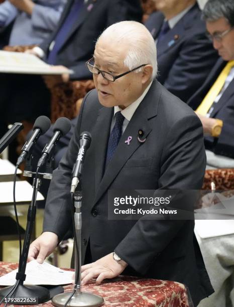 Japanese Health, Labor and Welfare Minister Keizo Takemi speaks at a House of Representatives budget committee session in Tokyo on Nov. 21, 2023.