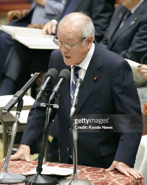 Japanese Finance Minister Shunichi Suzuki speaks at a House of Representatives budget committee session in Tokyo on Nov. 21, 2023.