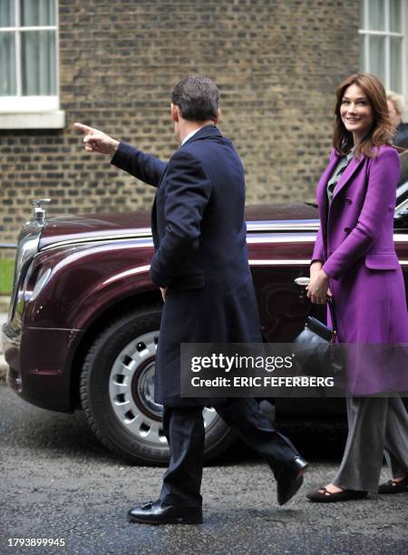 French President Nicolas Sarkozy and his wife Carla Bruni-Sarkozy arrive at 10 Downing Street in London, on March 27, 2008 to meet British Prime...