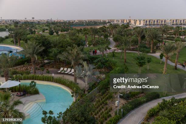 View of the community gardens at Damac Hills 2, a family friendly community in the desert which has been fitted out with lush green lawns, greenery,...