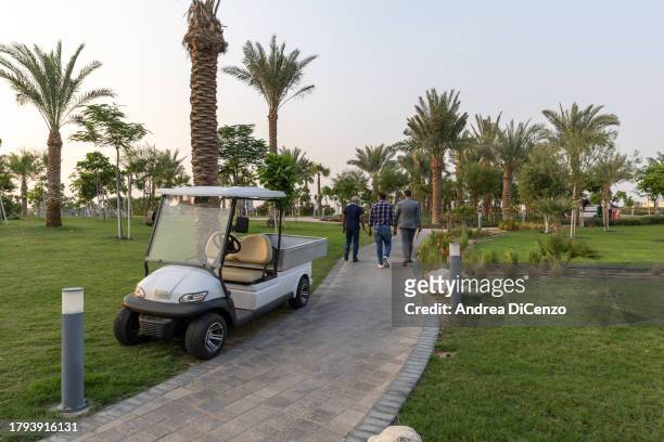 Golf cart at Damac Hills 2, a family friendly community in the desert which has been fitted out with lush green lawns, greenery, and a water park for...