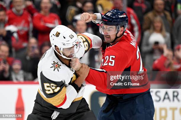 Dylan McIlrath of the Washington Capitals fights against Keegan Kolesar of the Vegas Golden Knights in the first period at Capital One Arena on...