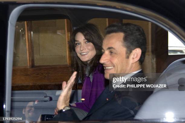 French President Nicolas Sarkozy and his wife Carla Bruni-Sarkozy leave Windsor Castle in south-east England, on March 27, 2008. Britain and France...