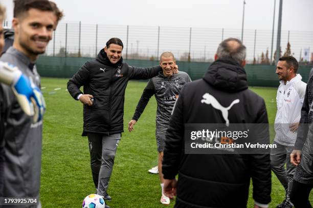 Head Coach Gerardo Seoane welcomes Stefan Lainer back to training after recovering from cancer during a training session of Borussia Moenchengladbach...