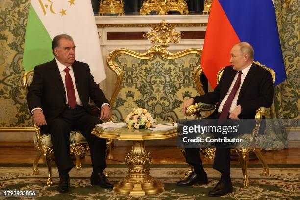 Russian President Vladimir Putin talks with Tajik President Emomali Rakhmon at the Grand Kremlin Palace on November 21 in Moscow, Russia. President...