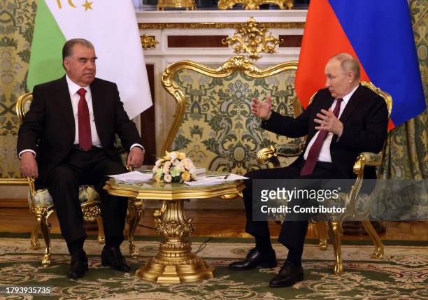 Russian President Vladimir Putin talks with Tajik President Emomali Rakhmon at the Grand Kremlin Palace on November 21 in Moscow, Russia. President...