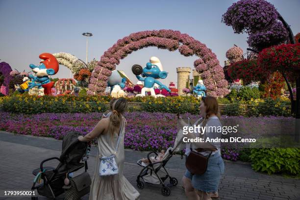 Tourists come to look at over 150 million flowers at the Dubai Miracle Garden on November 8, 2023 in Dubai, United Arab Emirates. In the UAE, where...