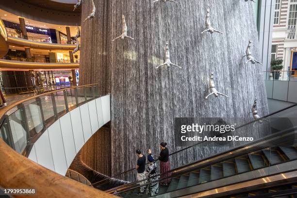 The Dubai Mall waterfall on November 15, 2023 in Dubai, United Arab Emirates. In the UAE, where 42 percent of water is sourced from energy-intensive...