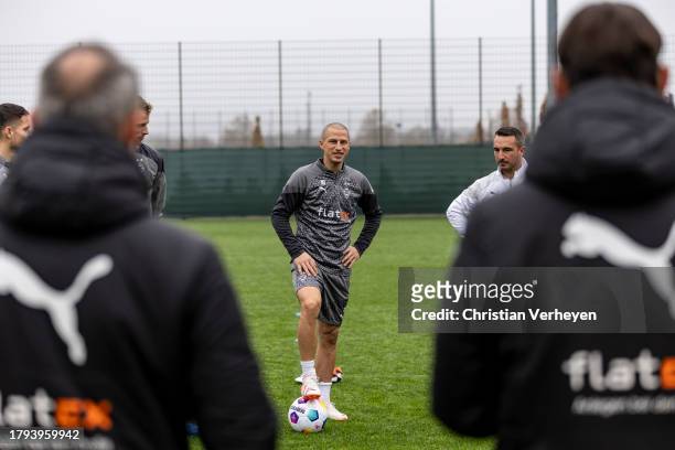 The Team of Borussia welcomes Stefan Lainer back to training after recovering from cancer during a training session of Borussia Moenchengladbach at...