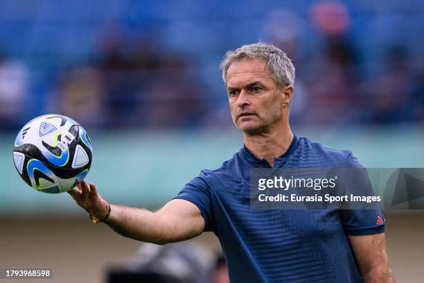Germany Head Coach Christian Wueck holds a ball during FIFA U-17 World Cup Round of 16 match between Germany and USA at Si Jalak Harupat Stadium on...