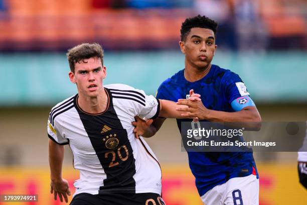 Robert Ramsak of Germany fights for position with Pedro Soma of United States during FIFA U-17 World Cup Round of 16 match between Germany and USA at...