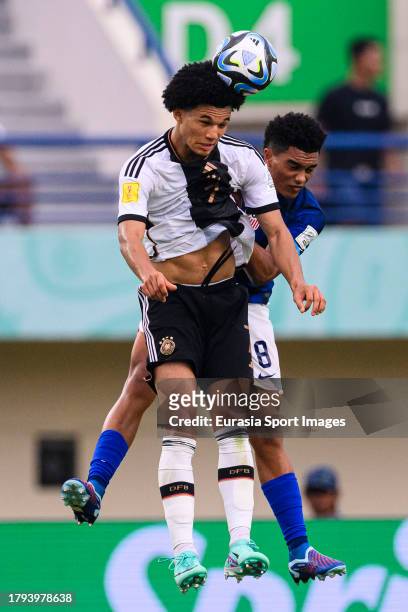 Paris Brunner of Germany fights for heading the ball with Pedro Soma of United States during FIFA U-17 World Cup Round of 16 match between Germany...