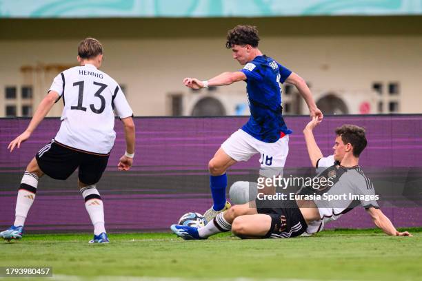 Robert Ramsak of Germany battles for the ball with Aiden Harangi of United States during FIFA U-17 World Cup Round of 16 match between Germany and...