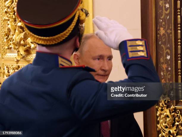 Russian President Vladimir Putin enters the hall during Russian-Tajik talks at the Grand Kremlin Palace on November 21 in Moscow, Russia. President...