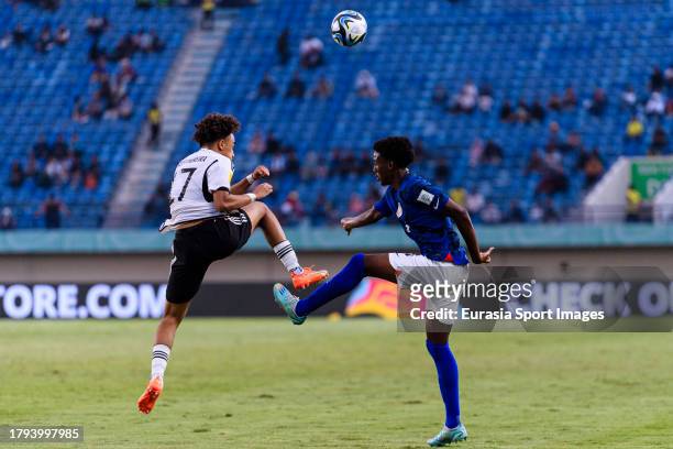 Eric Da Silva Moreira of Germany battles for the ball with Tahir Reid-Brown of United States during FIFA U-17 World Cup Round of 16 match between...