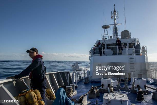 Philippine Coast Guard personnel on lookout during a resupply mission for the BRP Sierra Madre, in the Second Thomas Shoal in the disputed South...