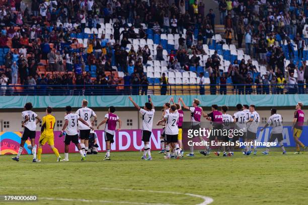 Germany squad celebrates after winning USA during FIFA U-17 World Cup Round of 16 match between Germany and USA at Si Jalak Harupat Stadium on...