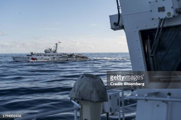 China Coast Guard ship as seen from the BRP Sindangan, during a resupply mission for the BRP Sierra Madre, in the Second Thomas Shoal in the disputed...