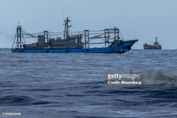Chinese fishing vessel, which Manila calls maritime militia, and Philippine's BRP Sierra Madre, in the Second Thomas Shoal in the disputed South...