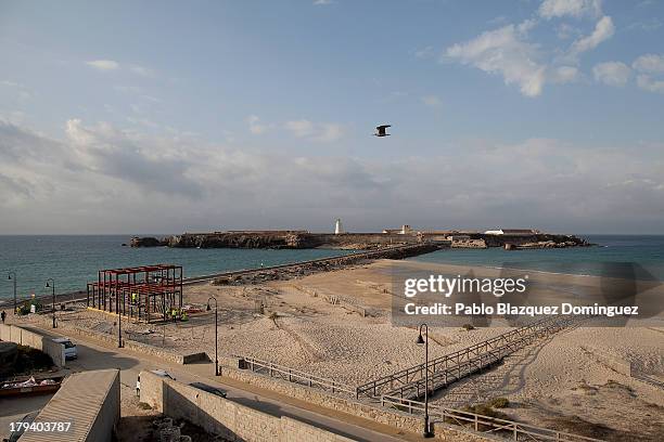 La Isla de las Palomas is seen in the distance surrounded by the Mediterranean Sea and the Atlantic Ocean on August 29, 2013 in Tarifa, Spain. La...