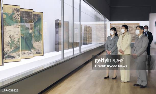 Japanese Emperor Naruhito, Empress Masako and their daughter Princess Aiko view an exhibition titled "Yamato-e: Traditions of Beauty from the...