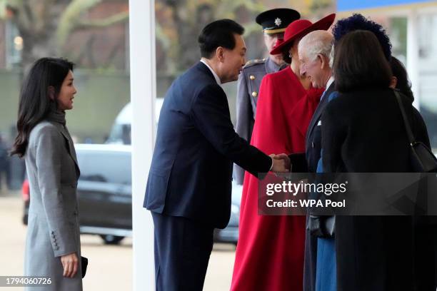 President of Korea Yoon Suk Yeol shakes hands with Britain's King Charles III during a ceremonial welcome for The President and the First Lady of the...