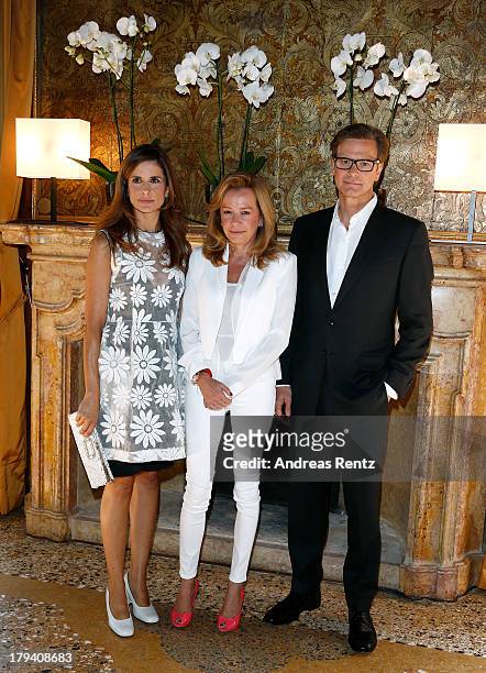 Livia Firth, Caroline Scheufele and Colin Firth attend Chopard Photocall during the 70th Venice International Film Festival at Palazzo del Casino on...