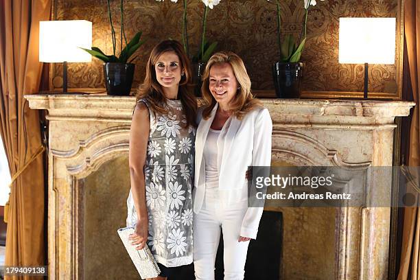 Livia Firth and Caroline Scheufele attend Chopard Photocall during the 70th Venice International Film Festival at Palazzo del Casino on September 3,...