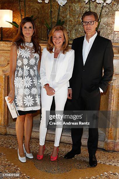 Livia Firth, Caroline Scheufele and Colin Firth attend Chopard Photocall during the 70th Venice International Film Festival at Palazzo del Casino on...