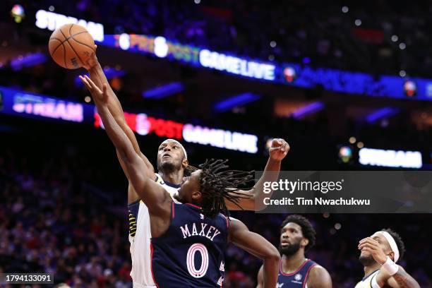 Myles Turner of the Indiana Pacers blocks Tyrese Maxey of the Philadelphia 76ers during the fourth quarterat the Wells Fargo Center on November 14,...