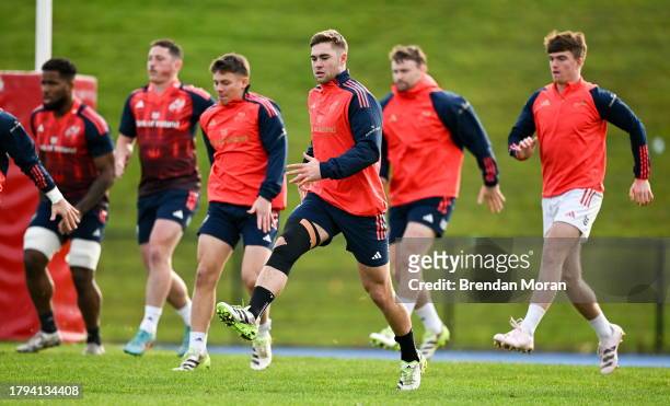 Limerick , Ireland - 21 November 2023; Jack Crowley, centre, during a Munster rugby squad training session at University of Limerick in Limerick.