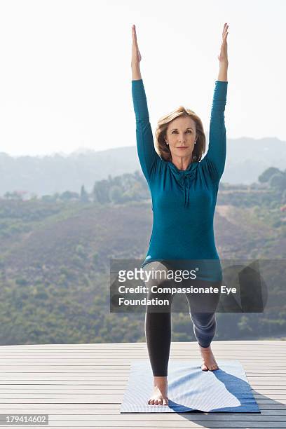 woman practicing yoga - cef do not delete stock pictures, royalty-free photos & images