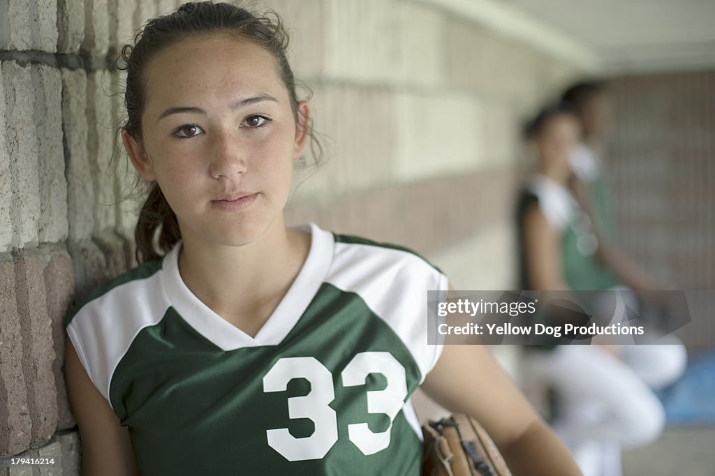 Close-up Portrait of Softball Player in Dugout