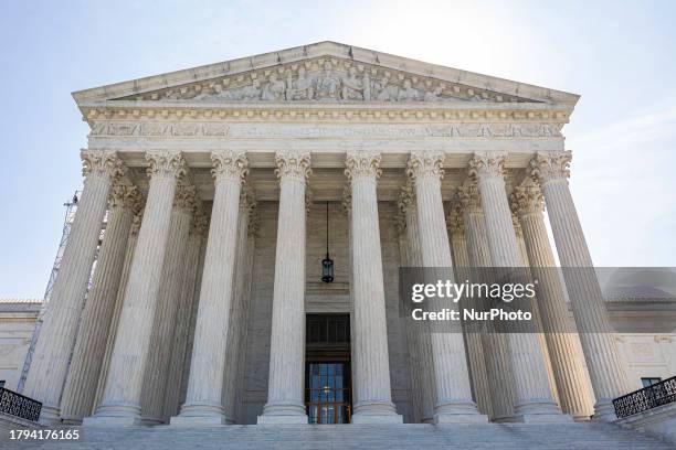 The Supreme Court of the United States SCOTUS in Washington D.C.. The Supreme Court Building during a sunny blue sky day, the historical building...