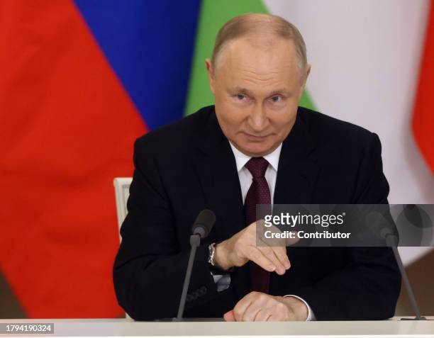 Russian President Vladimir Putin smiles during Russian-Tajik talks at the Grand Kremlin Palace, on November 21, 2023 in Moscow, Russia. President of...