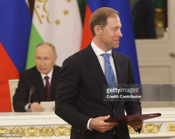 Russian Deputy Prime Minister Denis Manturov and President Vladimir Putin seen during Russian-Tajik meeting at the Grand Kremlin Palace, on November...