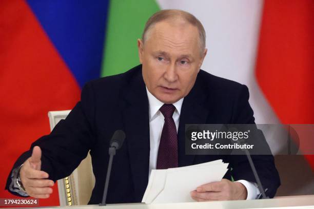 Russian President Vladimir Putin gestures during Russian-Tajik talks at the Grand Kremlin Palace, on November 21, 2023 in Moscow, Russia. President...