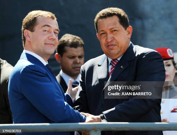 Venezuelan President Hugo Chavez and his Russian counterpart Dmitry Medvedev pose on the deck of the Udaloy-class anti-submarine vessel Admiral...