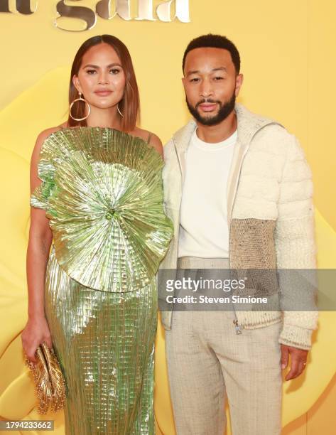 Chrissy Teigen and John Legend attend the Cult Gaia RE24 Runway Show on November 14, 2023 in Los Angeles, California.