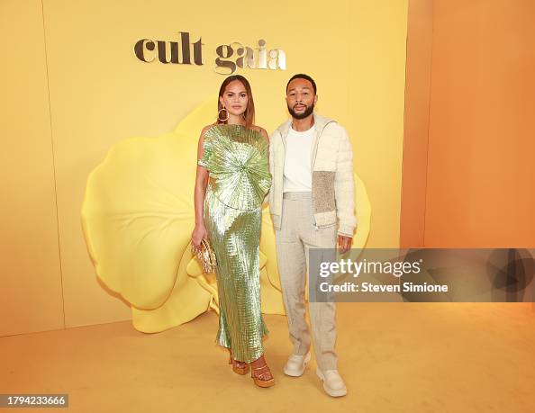 Chrissy Teigen and John Legend attend the Cult Gaia RE24 Runway Show