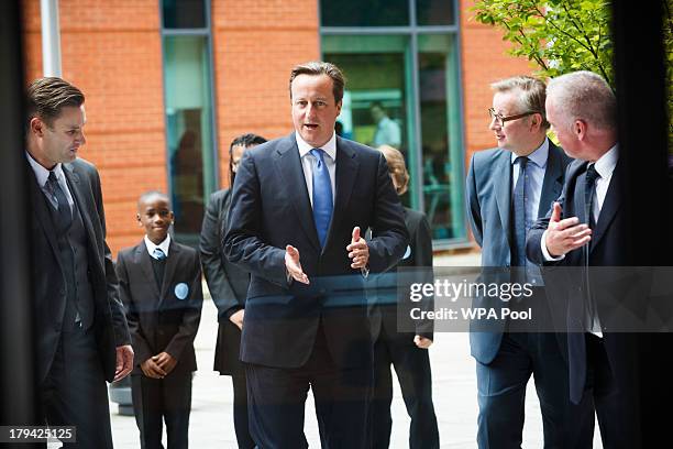 Prime Minister David Cameron and Education Secretary Michael Gove visit Perry Beeches III Free School, on September 3, 2013 in Birmingham, England....