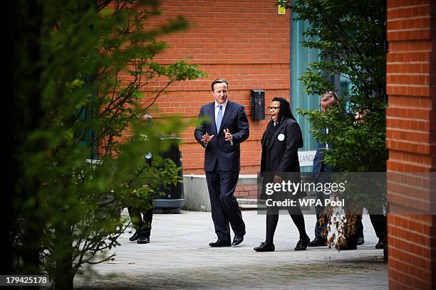 Prime Minister David Cameron visits Perry Beeches III Free School, on September 3, 2013 in Birmingham, England. It is predicted that by 2016 two...