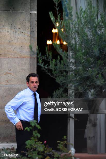 France's President and current European Union president Nicolas Sarkozy is pictured before the opening of a financial crisis summit gathering...