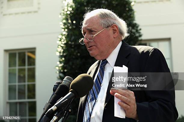 Sen. Carl Levin speaks to members of the media outside the West Wing of the White House after a meeting with President Barack Obama September 3, 2013...