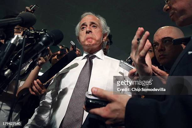 Senate Foreign Relations Committee ranking member Sen. Bob Corker talks to reporters before heading into a members-only classified briefing about...