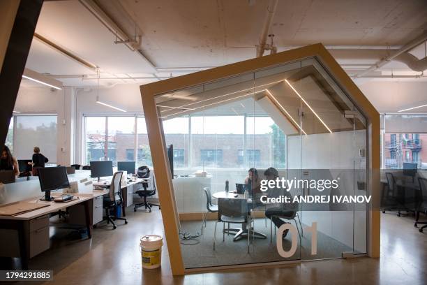 Employees work at Mila Quebec AI Institute on July 4 in Montreal, Canada. Mila is a not-for-profit organization whose Scientific Director, Yoshua...